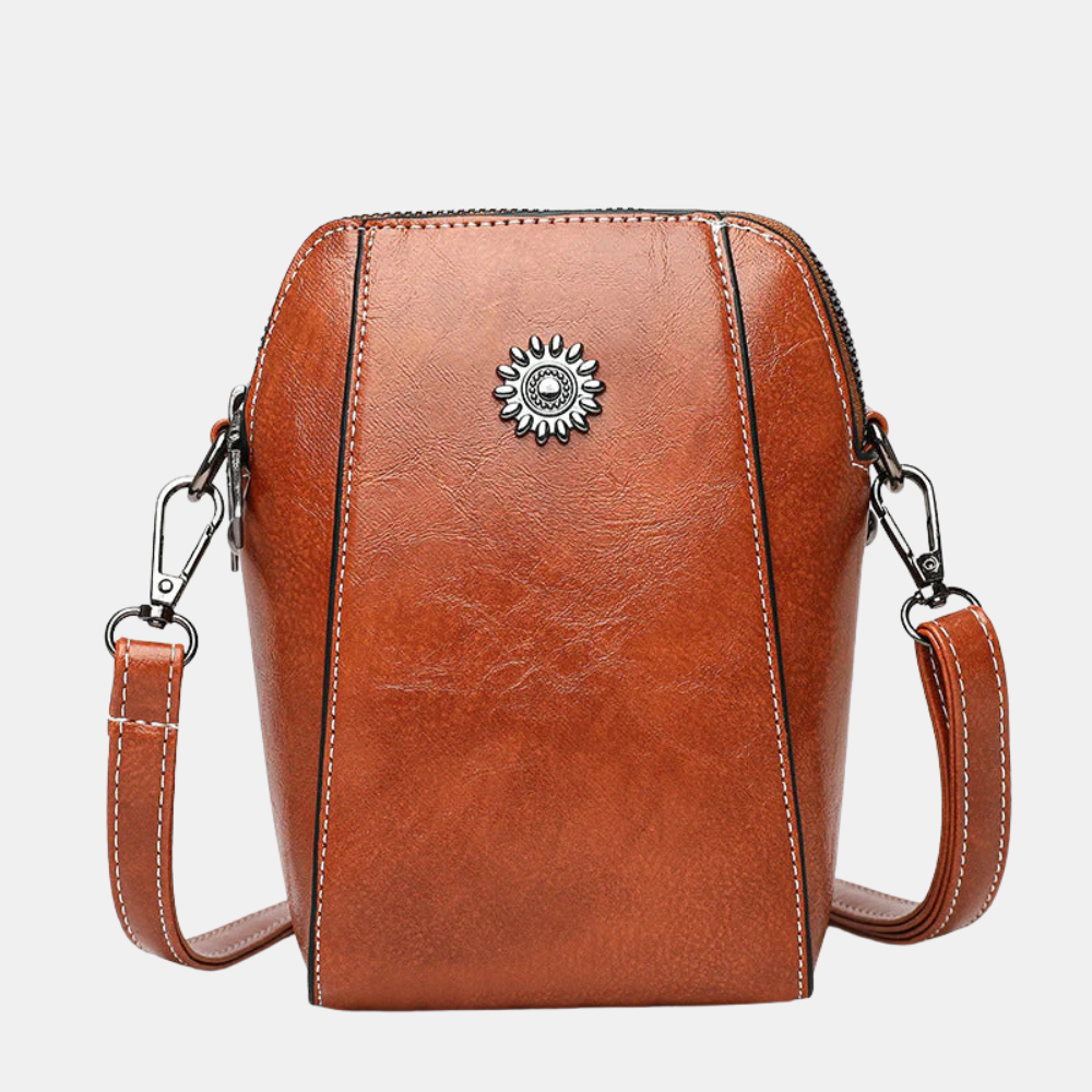 Chris Compact Mini Handbag shown in full-grain leather